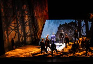 The oil workers, portrayed by members of the Opera Philadelphia Chorus, toil on the rig. Photo by Nicholas Korkos for Opera Philadelphia.