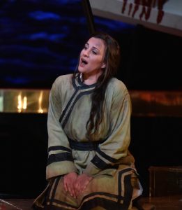 Liù (soprano Joyce El-Khoury) explains how she has stuck by her master, Timur, because his son, Calaf, once smiled at her. Photo: Kelly & Massa for Opera Philadelphia.
