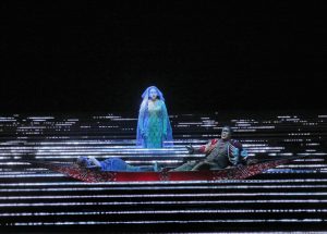 Tamara Mumford as the Pilgrim, Eric Owens as Jaufré Rudel and Susanna Phillips as Clémence in Kaija Saariaho's L'Amour de loin. Photo by Ken Howard/Metropolitan Opera