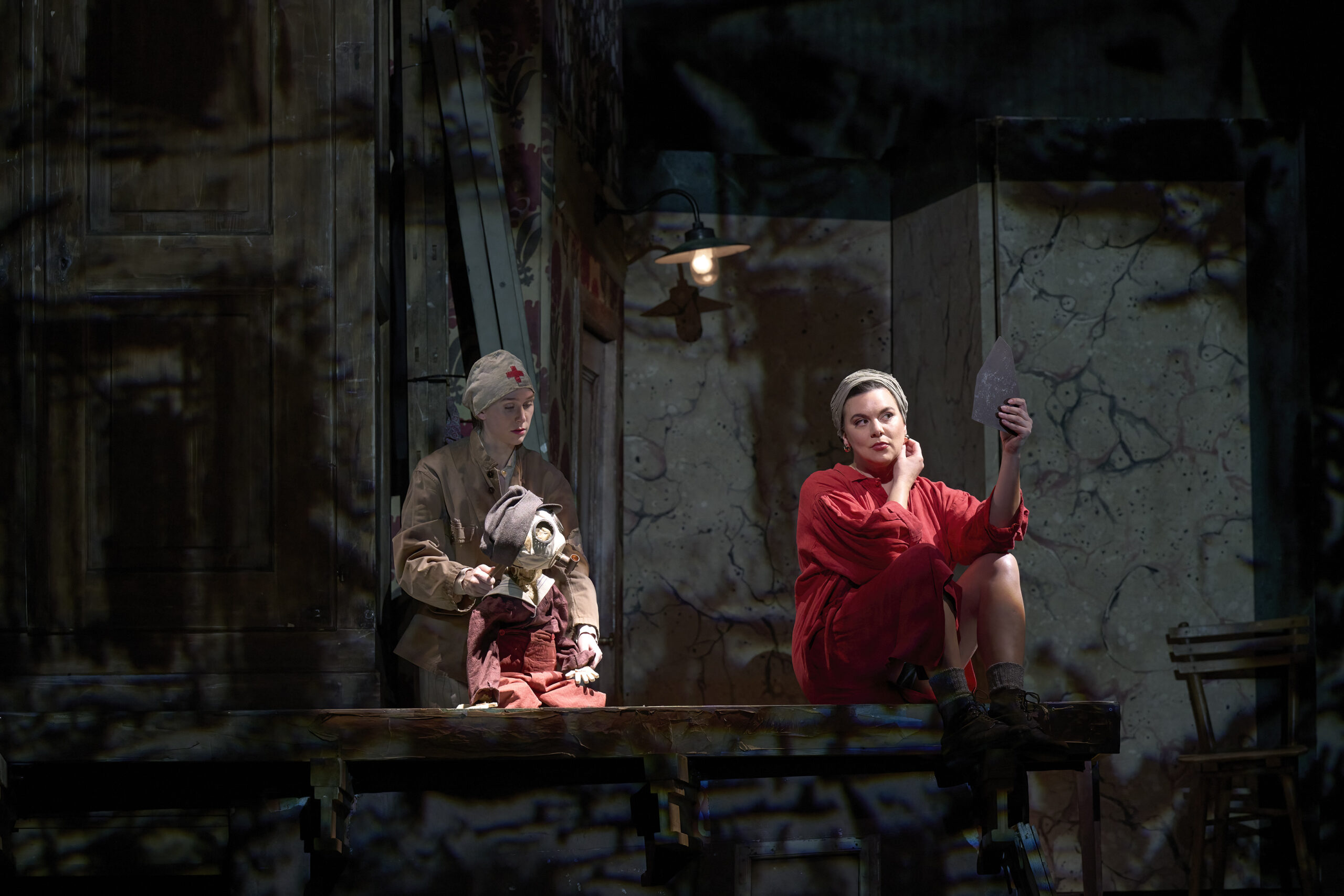 Brooklyn Marshall (puppeteer) and Ambur Braid (Marie) in the Canadian Opera Company’s Wozzeck.