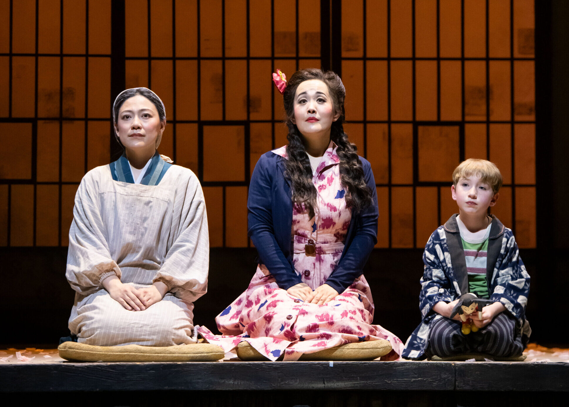 Nozomi Kato (Suzuki), Yasko Sato (Cio-Cio-San), and Myles Hunter-Gibbs (Sorrow) in Vancouver Opera’s Madama Butterfly. 