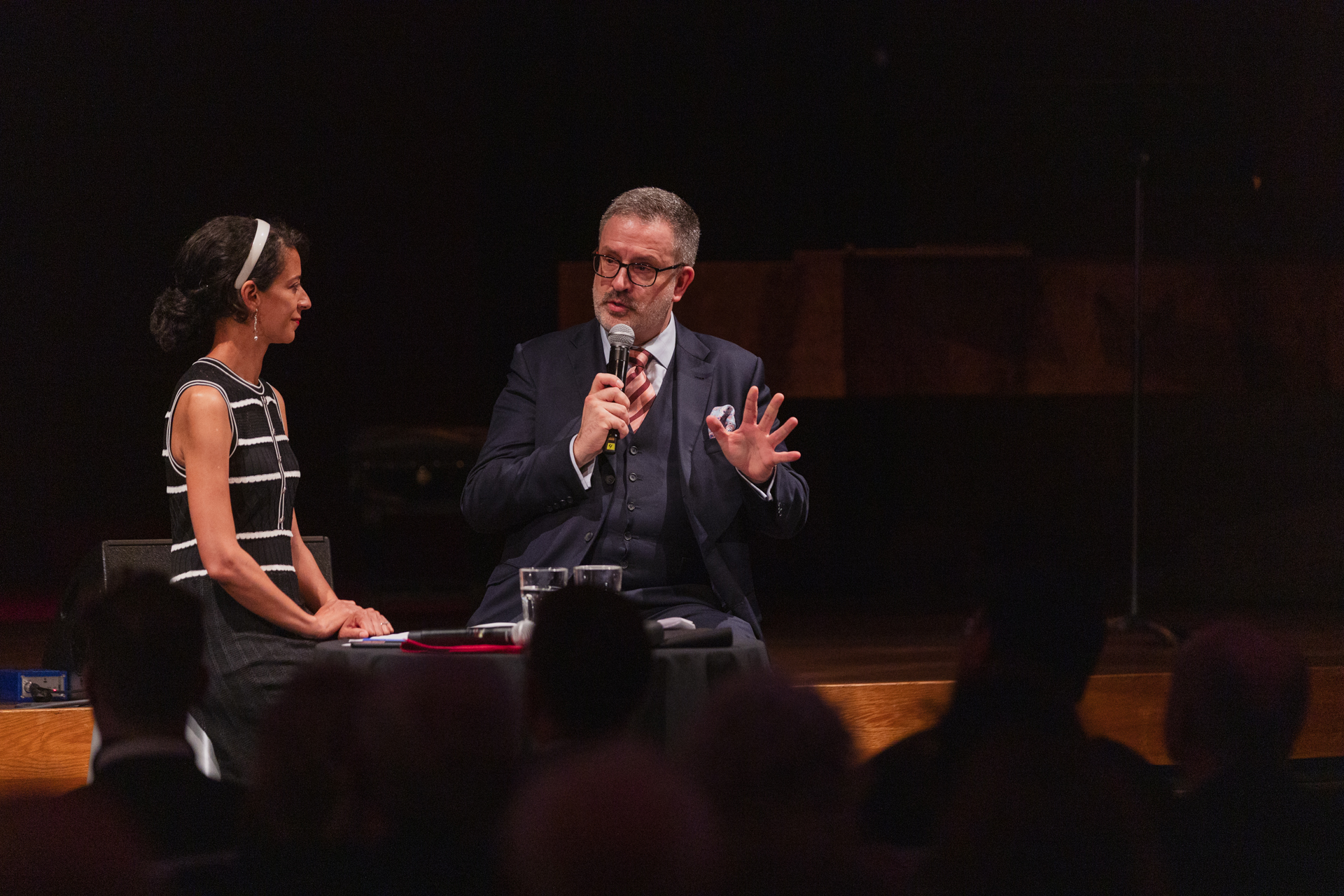Executive Director Caroline Louis and Artistic Director Olivier Godin speak at a table at the Salle Bourgie's 2025–2026 season launch event. 